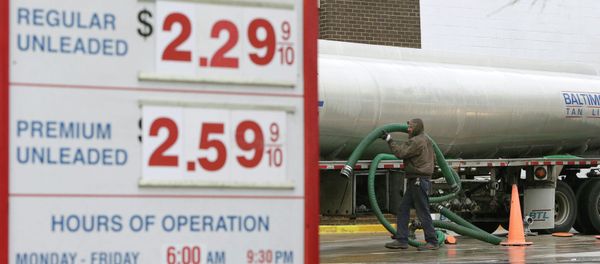A fuel tanker truck driver stores his hoses after a gasoline delivery at the Costco in Beltsville, Maryland A fuel tanker truck driver stores his hoses after a gasoline delivery at the Costco in Beltsville, Maryland - Sputnik International