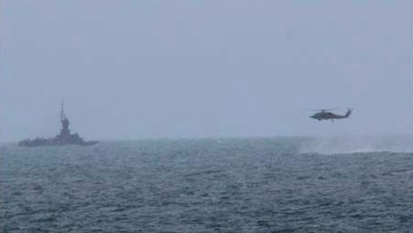 Lt. Col. Jhonson Simatupang of the Indonesian Air Force said Indonesian rescuers have sent a Super Puma helicopter to inspect an area where the Russian team assisting in the search for the AirAsia QZ8501 wreckage has found suspicious objects. - Sputnik International
