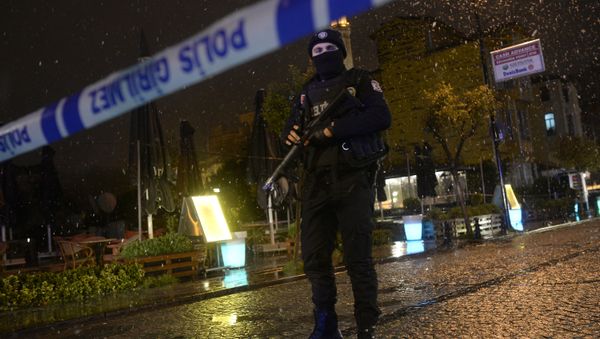 A police officer stands guard along a street after a female suicide bomber was killed on January 6, 2015 A police officer stands guard along a street after a female suicide bomber was killed on January 6, 2015 - Sputnik International