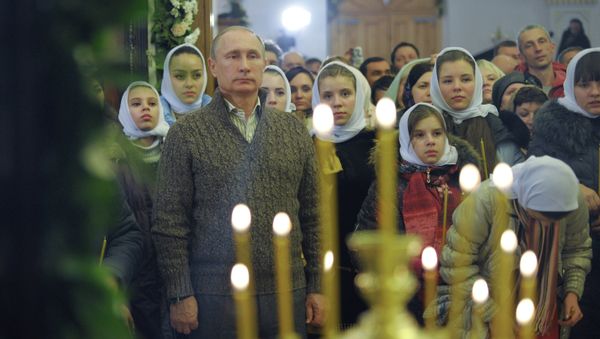 Russian President Putin attends Christmas service Russian President Putin attends Christmas service - Sputnik International