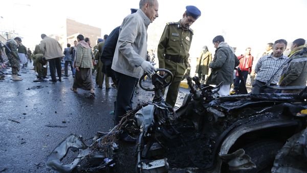 Police investigators look at the wreckage of a car at the scene of a car bomb outside the police college in Sanaa January 7, 2015 Police investigators look at the wreckage of a car at the scene of a car bomb outside the police college in Sanaa January 7, 2015 - Sputnik International