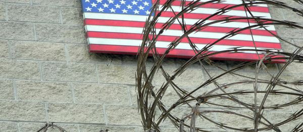 This August 7, 2013 file photo shows the US flag at the US Naval Base in Guantanamo Bay, Cuba This August 7, 2013 file photo shows the US flag at the US Naval Base in Guantanamo Bay, Cuba - Sputnik International