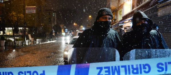 ISTANBUL, Jan. 6, 2015 -- Policemen stand on alert outside the accident site in Istanbul, Turkey on Jan. 6, 2015 - Sputnik International