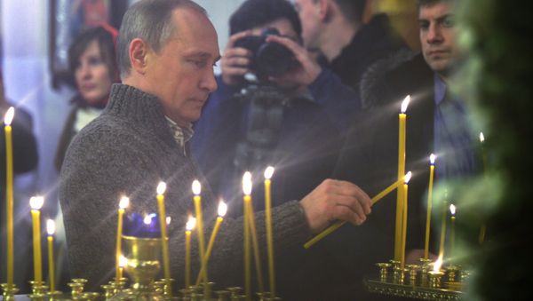 Russian President Putin attends Christmas service - Sputnik International