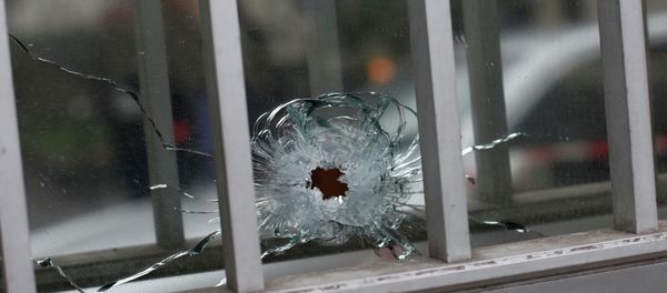 A bullet impact is seen in a window A bullet impact is seen in a window - Sputnik International
