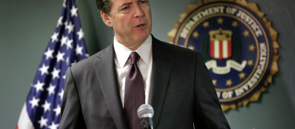 FBI Director James Comey takes questions from members of the media during a news conference, Tuesday, Nov. 18, 2014, in Boston FBI Director James Comey takes questions from members of the media during a news conference, Tuesday, Nov. 18, 2014, in Boston - Sputnik International