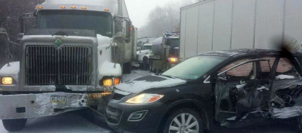 Bauer Truck Repair, vehicles remain at the scene of a fatal 18-vehicle pileup that occurred in whiteout conditions Wednesday, Jan. 7, 2015 Bauer Truck Repair, vehicles remain at the scene of a fatal 18-vehicle pileup that occurred in whiteout conditions Wednesday, Jan. 7, 2015 - Sputnik International