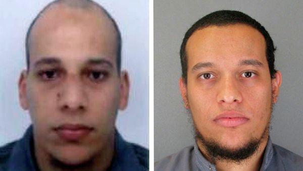 This photo provided by The Paris Police Prefecture Thursday, Jan.8, 2015 shows the suspects Cherif, left, and Said Kouachi in the newspaper attack along with a plea for witnesses This photo provided by The Paris Police Prefecture Thursday, Jan.8, 2015 shows the suspects Cherif, left, and Said Kouachi in the newspaper attack along with a plea for witnesses - Sputnik International