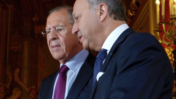 Russian Foreign Minister Sergei Lavrov, left, meets with his French counterpart Laurent Fabius Russian Foreign Minister Sergei Lavrov, left, meets with his French counterpart Laurent Fabius - Sputnik International