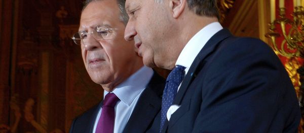 Russian Foreign Minister Sergei Lavrov, left, meets with his French counterpart Laurent Fabius Russian Foreign Minister Sergei Lavrov, left, meets with his French counterpart Laurent Fabius - Sputnik International