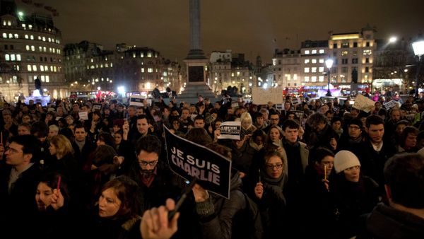 People hold up pens and posters reading 'I am Charlie' in French as they take part in a vigil of people, including many who were French, to show solidarity with those killed in an attack at the Paris offices of weekly newspaper Charlie Hebdo, in Trafalgar Square, London, Wednesday, Jan. 7, 2015 People hold up pens and posters reading 'I am Charlie' in French as they take part in a vigil of people, including many who were French, to show solidarity with those killed in an attack at the Paris offices of weekly newspaper Charlie Hebdo, in Trafalgar Square, London, Wednesday, Jan. 7, 2015 - Sputnik International