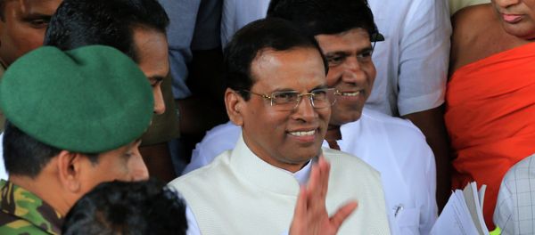 Sri Lanka's newly elected President Maithripala Sirisena waves as he leaves the Department of Election office on January 9, 2015. Sri Lanka's newly elected President Maithripala Sirisena waves as he leaves the Department of Election office on January 9, 2015. - Sputnik International