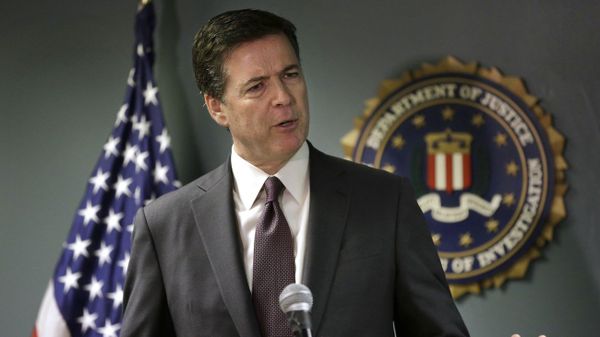 FBI Director James Comey takes questions from members of the media during a news conference, Tuesday, Nov. 18, 2014, in Boston. - Sputnik International