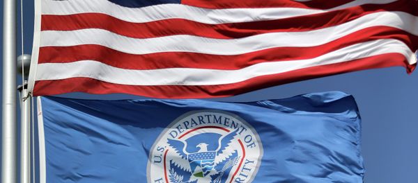 The US and US Department of Homeland Security flags The US and US Department of Homeland Security flags - Sputnik International