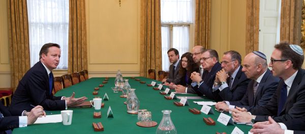 British Prime Minister David Cameron (L) talks with members of the Jewish Leadership Council including Gerald Ronson (4L) and Jonathan Goldstein (R) during their annual meeting at 10 Downing Street in London on Janurary 13, 2015 British Prime Minister David Cameron (L) talks with members of the Jewish Leadership Council including Gerald Ronson (4L) and Jonathan Goldstein (R) during their annual meeting at 10 Downing Street in London on Janurary 13, 2015 - Sputnik International