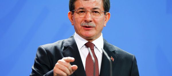 Turkish Prime Minister Ahmet Davutoglu speaks to media after his meeting with German Chancellor Angela Merkel at the Chancellery in Berlin, January 12, 2015 - Sputnik International