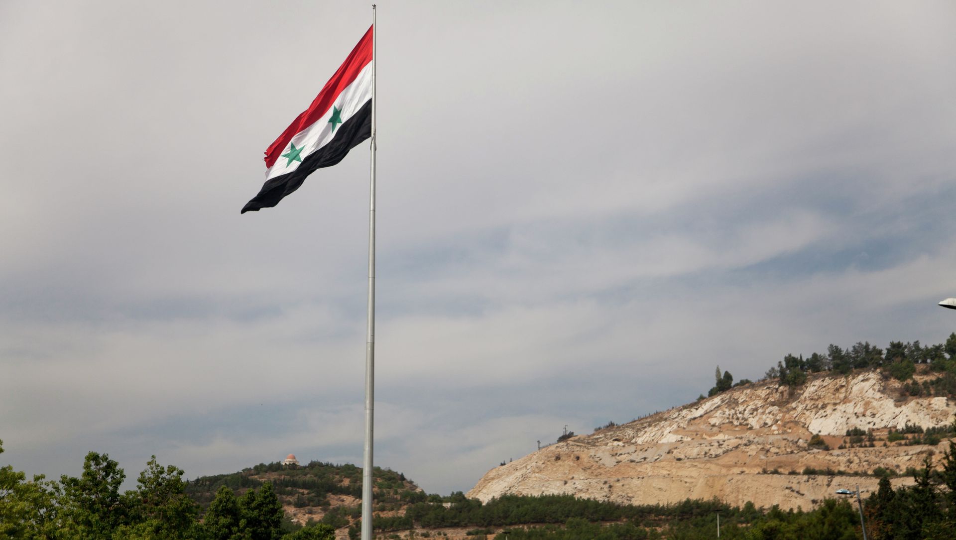Syrian flag over the capital, Damascus, Syria Syrian flag over the capital, Damascus, Syria - Sputnik International, 1920, 11.02.2021