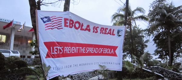A banner reading 'Lets prevent the spread of Ebola, in front of the city hall in Monrovia, Liberia, Thursday, July 31, 2014 A banner reading 'Lets prevent the spread of Ebola, in front of the city hall in Monrovia, Liberia, Thursday, July 31, 2014 - Sputnik International