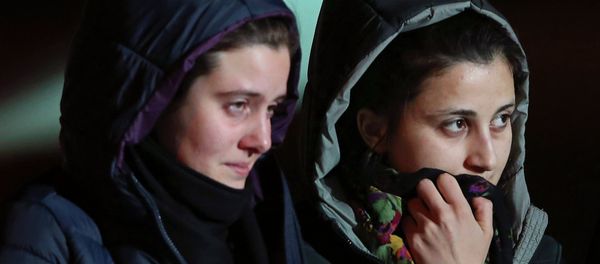 Greta Ramelli (L) and Vanessa Marzullo, two Italian aid workers taken hostage in Syria five months ago, arrive at Ciampino airport in Rome January 16, 2015 Greta Ramelli (L) and Vanessa Marzullo, two Italian aid workers taken hostage in Syria five months ago, arrive at Ciampino airport in Rome January 16, 2015 - Sputnik International