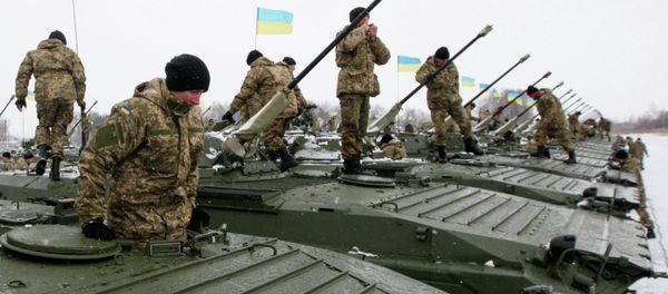 Ukrainian servicemen get inside armoured personnel carriers (APC) during a ceremony to hand over weapons, military equipment and aircraft to the army at a firing range outside Zhytomyr January 5, 2015 Ukrainian servicemen get inside armoured personnel carriers (APC) during a ceremony to hand over weapons, military equipment and aircraft to the army at a firing range outside Zhytomyr January 5, 2015 - Sputnik International