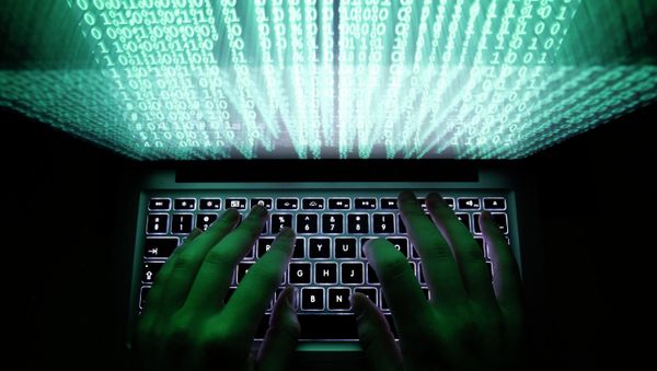 A man types on a computer keyboard A man types on a computer keyboard - Sputnik International