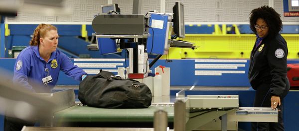 Transportation Security Administration employees check bags Transportation Security Administration employees check bags - Sputnik International
