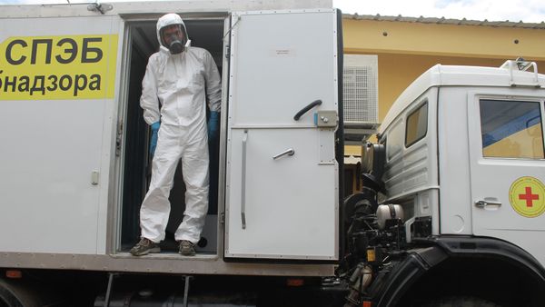 File Photo: Russian doctor Valentine Safronov stands inside a mobile medical lab donated by the Russian government to assist with the Ebola out-brake in Conakry, Guinea, Tuesday, Aug. 26, 2014. File Photo: Russian doctor Valentine Safronov stands inside a mobile medical lab donated by the Russian government to assist with the Ebola out-brake in Conakry, Guinea, Tuesday, Aug. 26, 2014. - Sputnik International