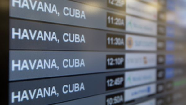 Charter flights from Miami to Havana are shown on a departures monitor at Miami International Airport, Friday, Jan. 16, 2015 in Miami Charter flights from Miami to Havana are shown on a departures monitor at Miami International Airport, Friday, Jan. 16, 2015 in Miami - Sputnik International