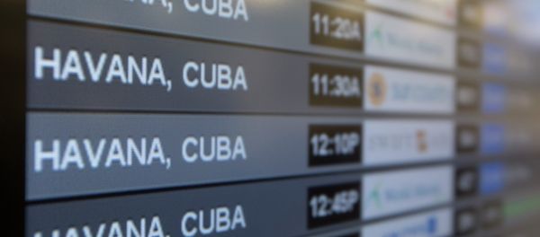 Charter flights from Miami to Havana are shown on a departures monitor at Miami International Airport, Friday, Jan. 16, 2015 in Miami - Sputnik International
