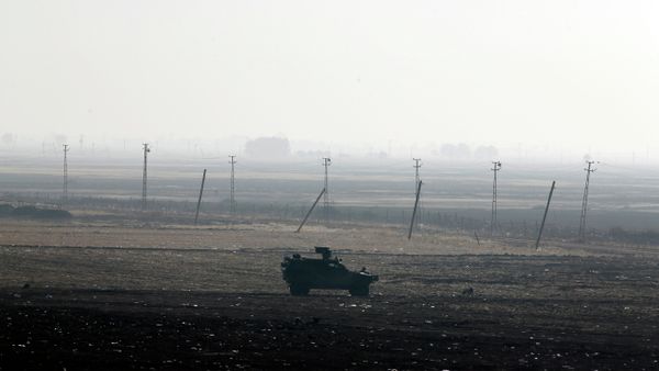 A Turkish forces armoured vehicle is stationed along the border road in Mursitpinar, nn the outskirts of Suruc, on the Turkey-Syria border A Turkish forces armoured vehicle is stationed along the border road in Mursitpinar, nn the outskirts of Suruc, on the Turkey-Syria border - Sputnik International