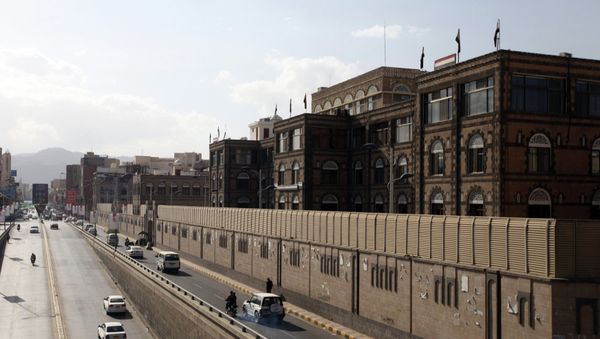 Vehicles drive past the office building of Ahmed Awadh bin Mubarak, in Sanaa January 17, 2015 Vehicles drive past the office building of Ahmed Awadh bin Mubarak, in Sanaa January 17, 2015 - Sputnik International