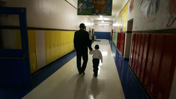 More than 50 percent of American students attending the nation's public schools live in poverty - Sputnik International