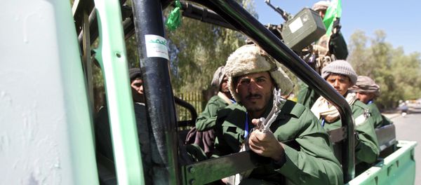 Shi'ite Houthi fighters ride a truck Shi'ite Houthi fighters ride a truck - Sputnik International