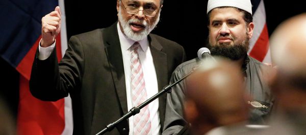 Imam Abdul Malik Mujahid, left, and Iman Zia Sheikh, right, address attendees of a muslim conference at the Curtis Culwell Center, Saturday, Jan. 17, 2015, in Garland, Texas. Imam Abdul Malik Mujahid, left, and Iman Zia Sheikh, right, address attendees of a muslim conference at the Curtis Culwell Center, Saturday, Jan. 17, 2015, in Garland, Texas. - Sputnik International