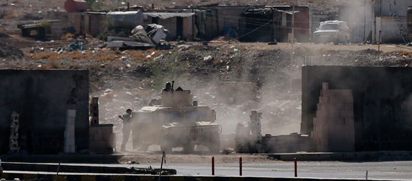 A vehicle from the Presidential Protection Forces is positioned on a street during clashes near the Presidential Palace in Sanaa A vehicle from the Presidential Protection Forces is positioned on a street during clashes near the Presidential Palace in Sanaa - Sputnik International