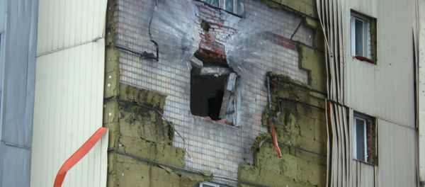 A residential building near Donetsk railway station damaged in the result of shelling by the Ukrainian army - Sputnik International