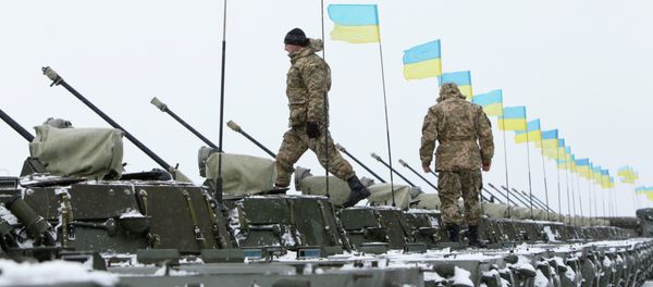 Ukrainian servicemen walk on armoured personnel carriers (APC) Ukrainian servicemen walk on armoured personnel carriers (APC) - Sputnik International