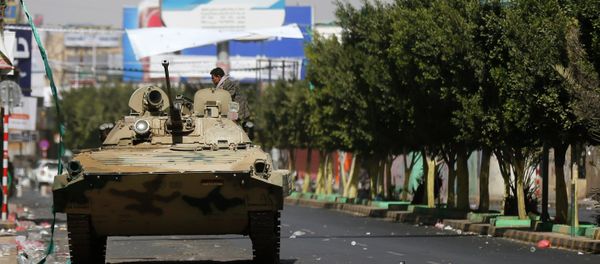 A Houthi fighter sits in a military vehicle belonging to Houthi fighters A Houthi fighter sits in a military vehicle belonging to Houthi fighters - Sputnik International