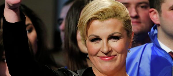 Kolinda Grabar-Kitarovic of the opposition HDZ celebrates her victory in Croatia's presidential run-off election on the stage at her campaign headquarters in Zagreb January 11, 2015. Kolinda Grabar-Kitarovic of the opposition HDZ celebrates her victory in Croatia's presidential run-off election on the stage at her campaign headquarters in Zagreb January 11, 2015. - Sputnik International