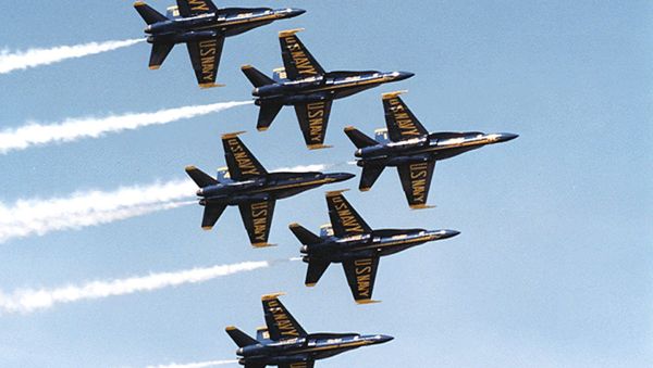This undated US Navy photo shows Navy F-18's flying in formation piloted by the Blue Angels precision flying team. - Sputnik International