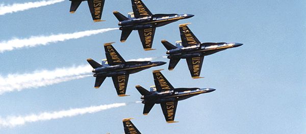 This undated US Navy photo shows Navy F-18's flying in formation piloted by the Blue Angels precision flying team. - Sputnik International