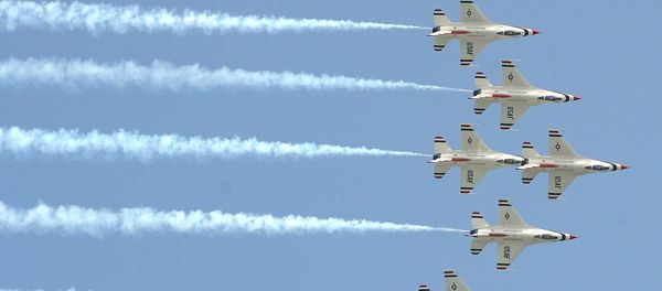 Aircraft of the 'Thunderbirds' US Air Force Air Demonstration Squadron fly as they perform during an air show at Don Muang airport in Bangkok - Sputnik International