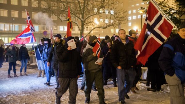 Norwegian sympathizers of the German right-wing populist movement PEGIDA (Patriotic Europeans Against the Islamisation of the Occident) carrying Norwegian flags march in Oslo - Sputnik International