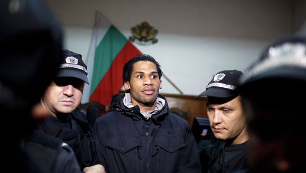 French citizen Fritz-Joly Joachin (C) arrives under police escort in front of a court in the southern city of Haskovo January 20, 2015. - Sputnik International