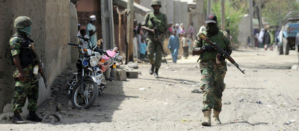 Soldiers walk in the street in the remote northeast town of Baga, Borno State. - Sputnik International