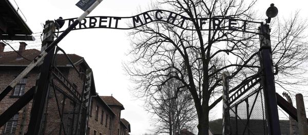 The sign Arbeit macht frei (Work makes you free) is pictured at the main gate of the former German Nazi concentration and extermination camp Auschwitz in Oswiecim The sign Arbeit macht frei (Work makes you free) is pictured at the main gate of the former German Nazi concentration and extermination camp Auschwitz in Oswiecim - Sputnik International