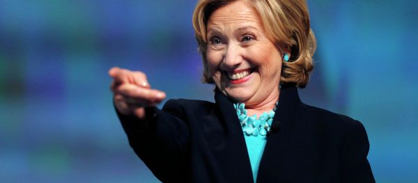 Former Secretary of State Hillary Rodham Clinton reacts as she is introduced to speak at the Massachusetts Conference for Women in Boston, Thursday, Dec. 4, 2014 - Sputnik International