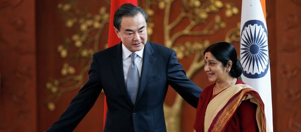 Indian External Affairs Minister Sushma Swaraj, right, and her Chinese counterpart, Wang Yi Indian External Affairs Minister Sushma Swaraj, right, and her Chinese counterpart, Wang Yi - Sputnik International