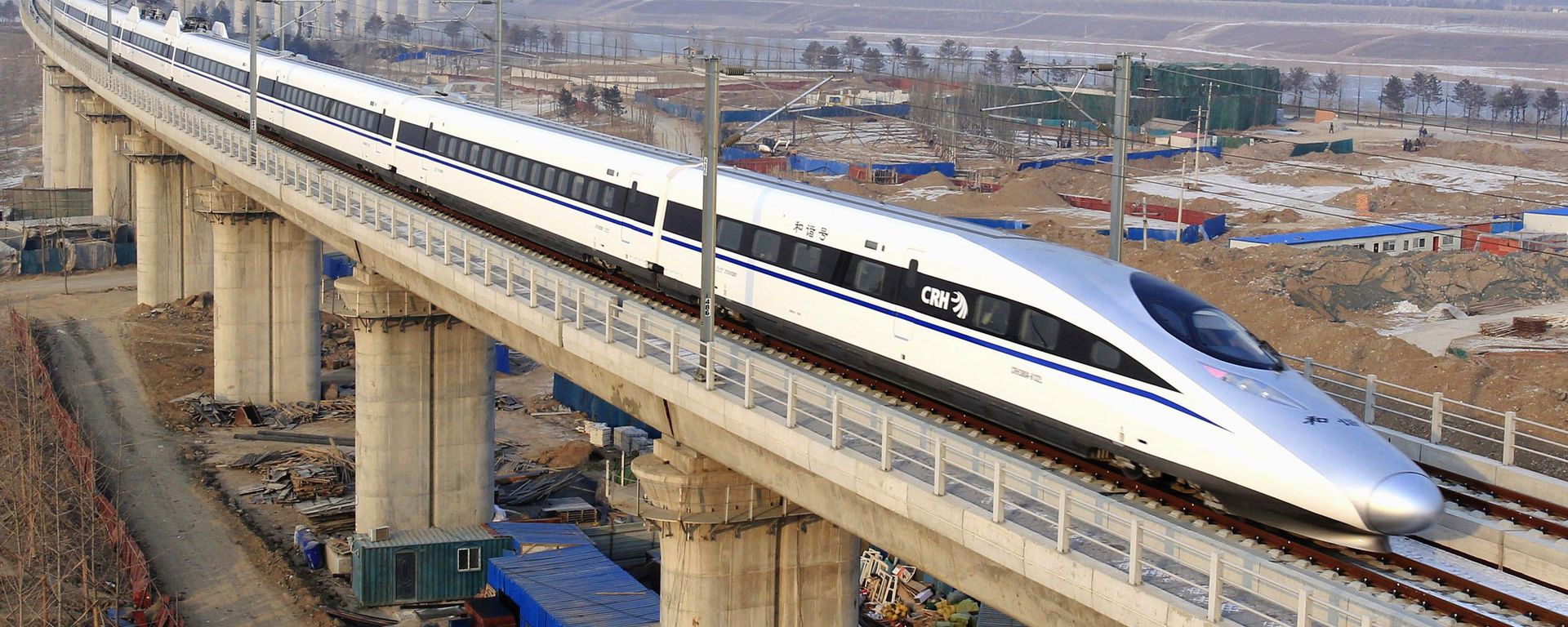 In this photo released by China's Xinhua news agency, a bullet train passes over Yongdinghe Bridge in Beijing Wednesday, Dec. 26, 2012 In this photo released by China's Xinhua news agency, a bullet train passes over Yongdinghe Bridge in Beijing Wednesday, Dec. 26, 2012 - Sputnik International, 1920, 20.11.2024