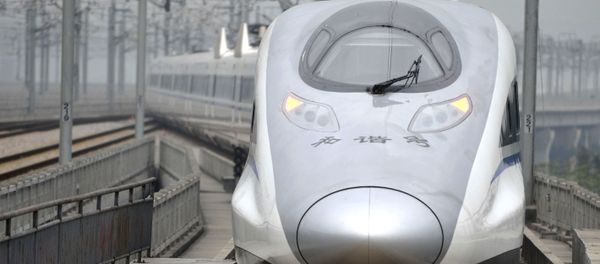 In this photo released by China's Xinhua news agency, a bullet train G80 leaves for Beijing from the Guangzhou South Railway Station in Guangzhou - Sputnik International